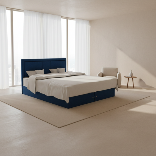 Blue bed frame with white bedding on a white background